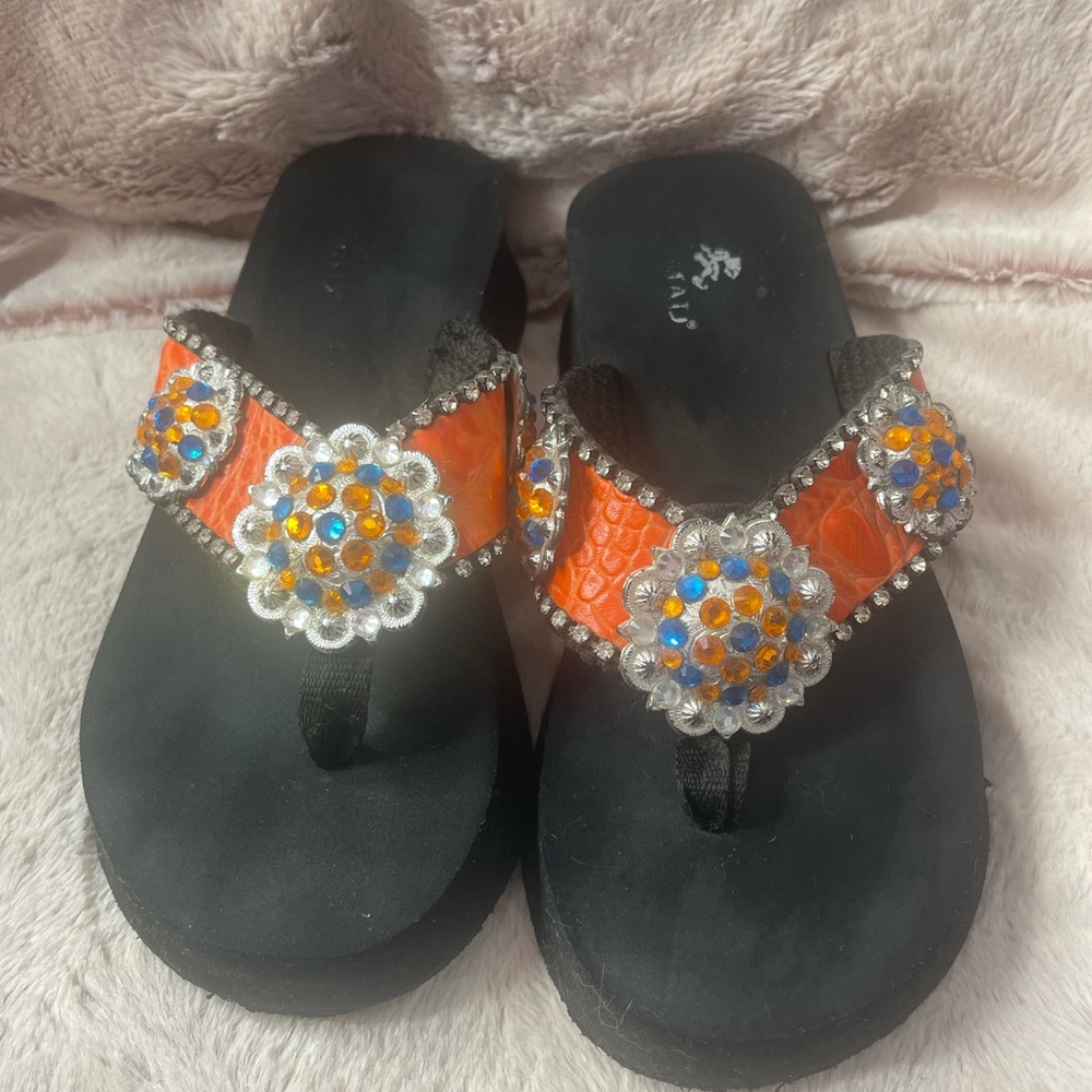 Swarovski custom made flip flops.